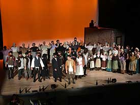 A very large cast of young people on stage in a production.Progress OKC worked with the community on updates and repairs to the theater.